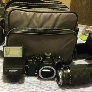 Cosina CT -1 camera wit zoom lens and flash
